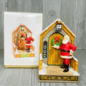 Hallmark Ornament 2011 Decking the Door Santa light up magic cores ornament